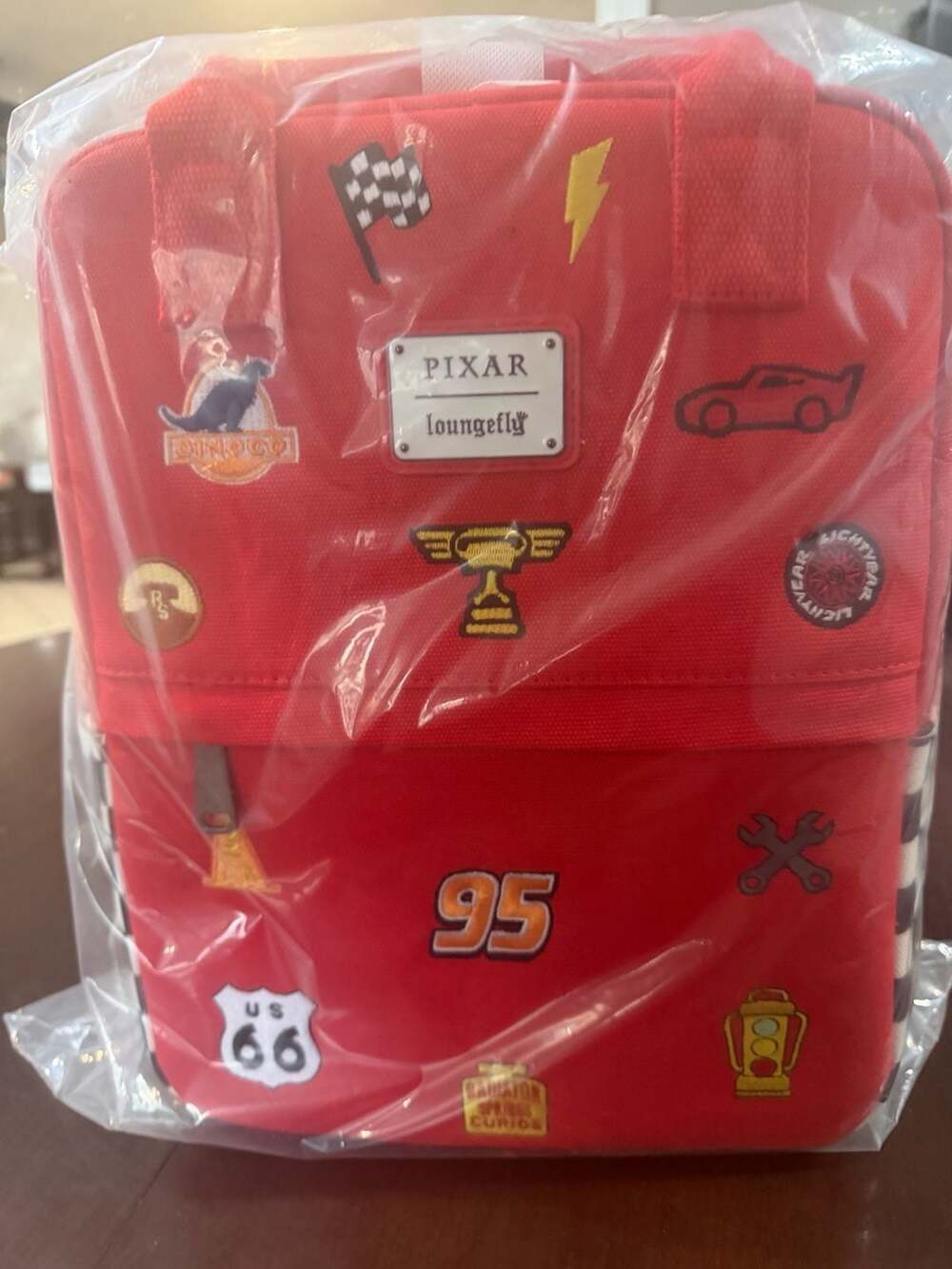 Loungefly Disney Pixar Cars Lightning McQueen Rust-eze Crossbody Bag